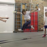 Mr Dan teaching French skipping at a school workshop